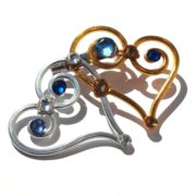 double-heart-brooch-silver-and-gold-left
